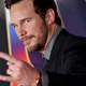 Chris Pratt gestures toward the camera in an event for Marvel's Thor.